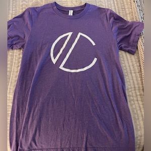Purple graphic T-Shirt. Size medium. Never worn.